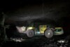Underground diesel loader operating in a mine tunnel