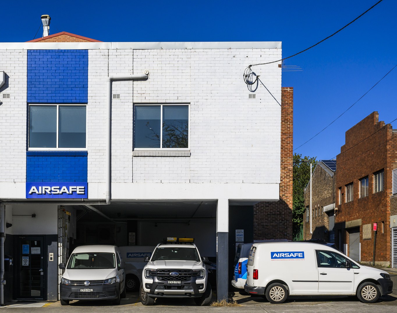 Airsafe's branded vehicles parked at the company's Beaconsfield office
