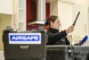 Airsafe consultant taking indoor air quality readings with a handheld Aeroqual monitor