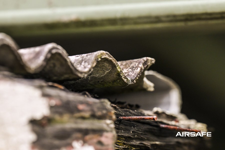Weathered corrugated fibro roofing on an older Sydney house